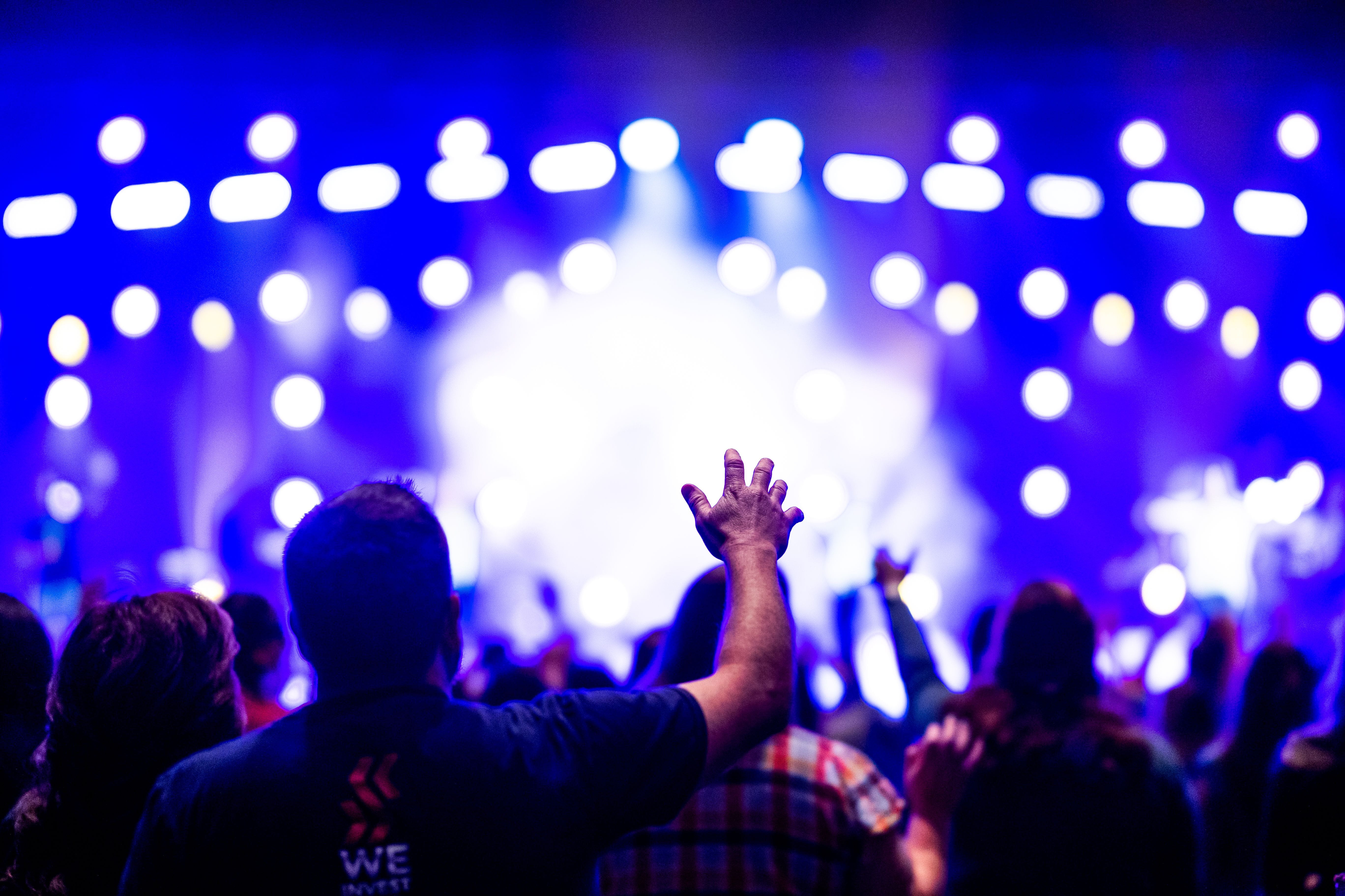 People dancing and celebrating at a nightclub